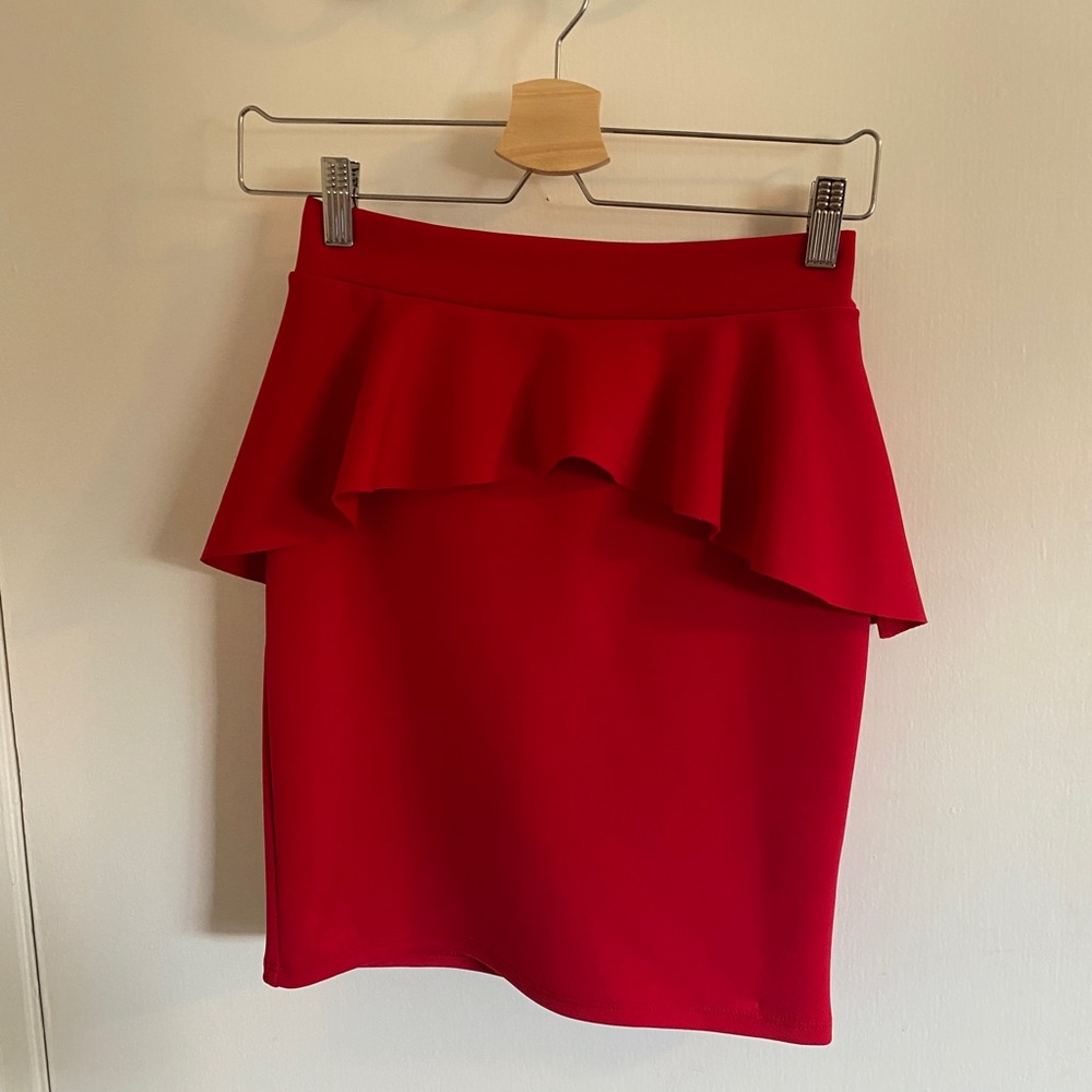 Stylish, fun peplum skirt. Perfect for the holidays. Worn twice, like new.